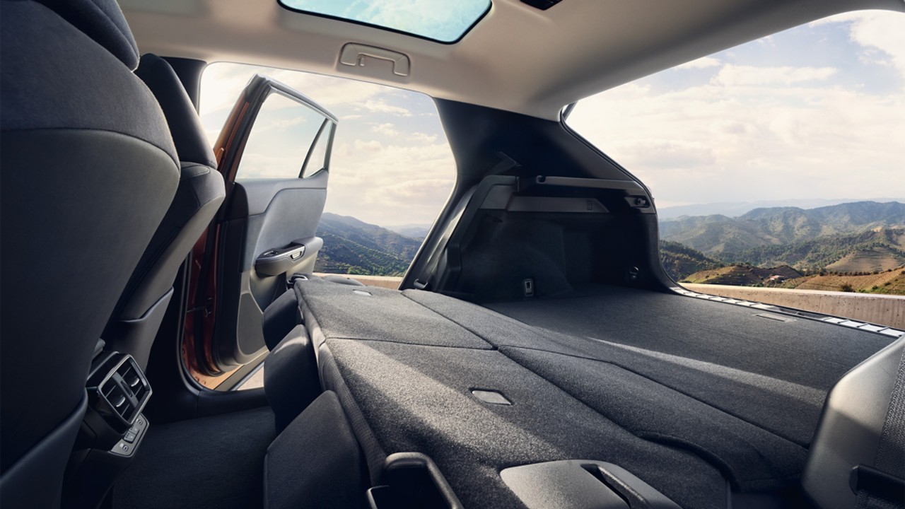 Rear interior of the Lexus RZ 450e with the passenger seats down