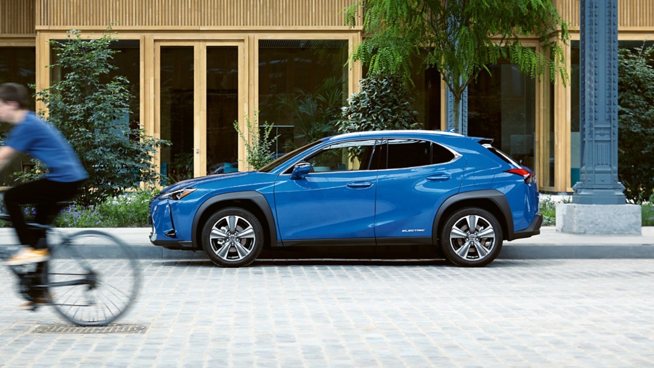 A Lexus UX 300e parked on a street