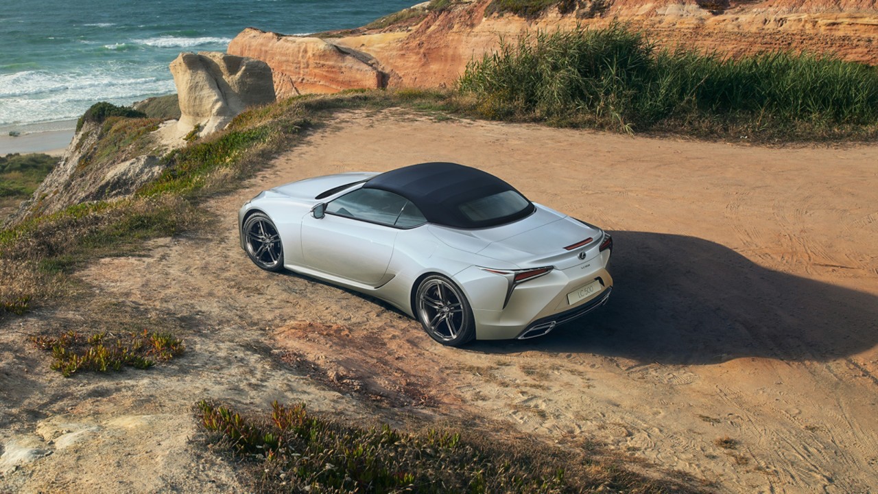 A Lexus LC Convertible parked on a coast line